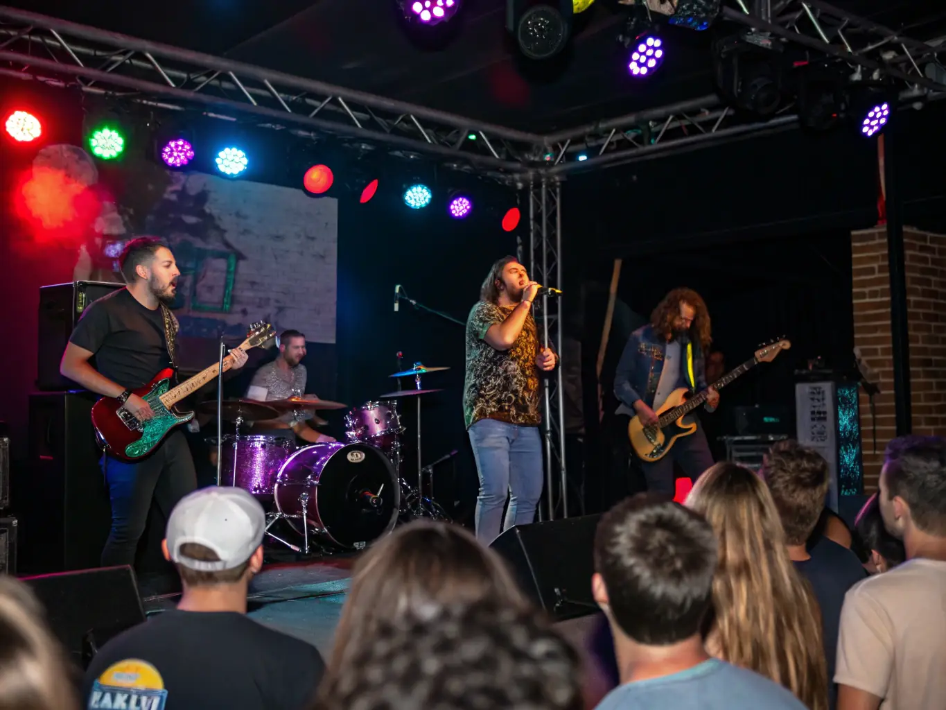 A vibrant image depicting a live musical performance at a local community center, showcasing musicians and audience members enjoying the event.